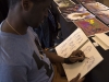 WINDSOR, Ont. (14/02/16) – Freelance concept artist Yannick Toney is pictured drawing a sketch while working at his booth at the 2016 Comic Book Syndicon at the St. Clair College Centre for the Arts in Windsor on Sunday, Feb. 14, 2016. Photo by Justin Prince