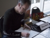 WINDSOR, Ont. (14/02/16) – Comic book artist Gibson Quarter works on a sketch drawing while taking part in the 2016 Comic Book Syndicon at the St. Clair College Centre for the Arts in Windsor on Sunday, Feb. 14, 2016. Quarter, who has best known for illustration work for British magazine WASTED!’s THE WAR ON DRUGS comic strip, was one of 16 comic book artists and illustrators in attendance. Others included Yanick Paquette, James Andervson and Johnny Desjardins. Photo by Justin Prince