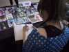 WINDSOR, Ont. (14/02/16) – London, Ont.-based artist Paige Cameron works on a drawing while sitting at her booth at the 2016 Comic Book Syndicon at the St. Clair College Centre for the Arts in Windsor on Sunday, Feb. 14, 2016. Photo by Justin Prince