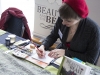 WINDSOR, Ont. (14/02/16) – Illustrator and sequential artist Megan Kearney works on a drawing while sitting at her booth at the 2016 Comic Book Syndicon at the St. Clair College Centre for the Arts in Windsor on Sunday, Feb. 14, 2016. Kearney is best known for her series Beauty and the Beast: The Comic Series. She has also had her work seen in publications such as history magazine Valor. Kearney was one of more than 10 guest artists at the convention. Photo by Justin Prince