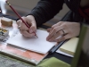 WINDSOR, Ont. (14/02/16) – Illustrator and sequential artist Megan Kearney works on a sketch while attending the 2016 Comic Book Syndicon at the St. Clair College Centre for the Arts in Windsor on Sunday, Feb. 14, 2016. Photo by Justin Prince