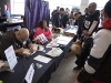 WINDSOR, Ont. (14/02/16) – Windsor-based comic book artist and illustrator Jonathan Rector (left) draws a sketch while being surrounded by a crowd of attendees at the 2016 Comic Book Syndicon at the St. Clair College Centre for the Arts in Windsor on Sunday, Feb. 14, 2016. Some of Rector’s current and future comic series include The Standard, Worlds in Peril and Jesop King. Photo by Justin Prince